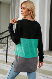 Colorblock long sleeve tee in black, teal, and gray with side slits