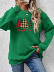 Green crewneck sweatshirt with plaid trees graphic and Merry Christmas text.