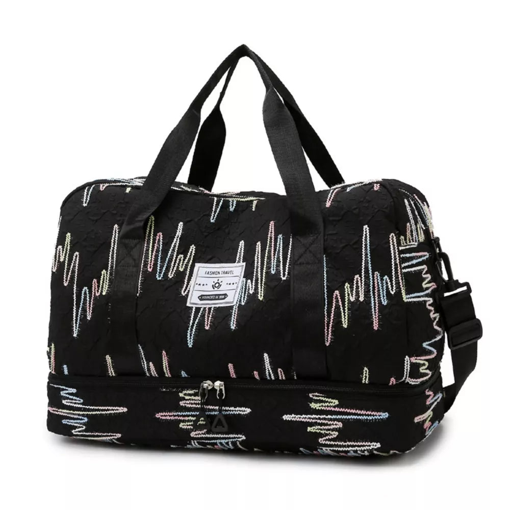 Textured black Oxford duffel bag with colorful wave pattern and dual zip bottom compartment.