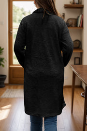 Black teddy bear texture duster coat with single button closure, long sleeves, and relaxed fit.