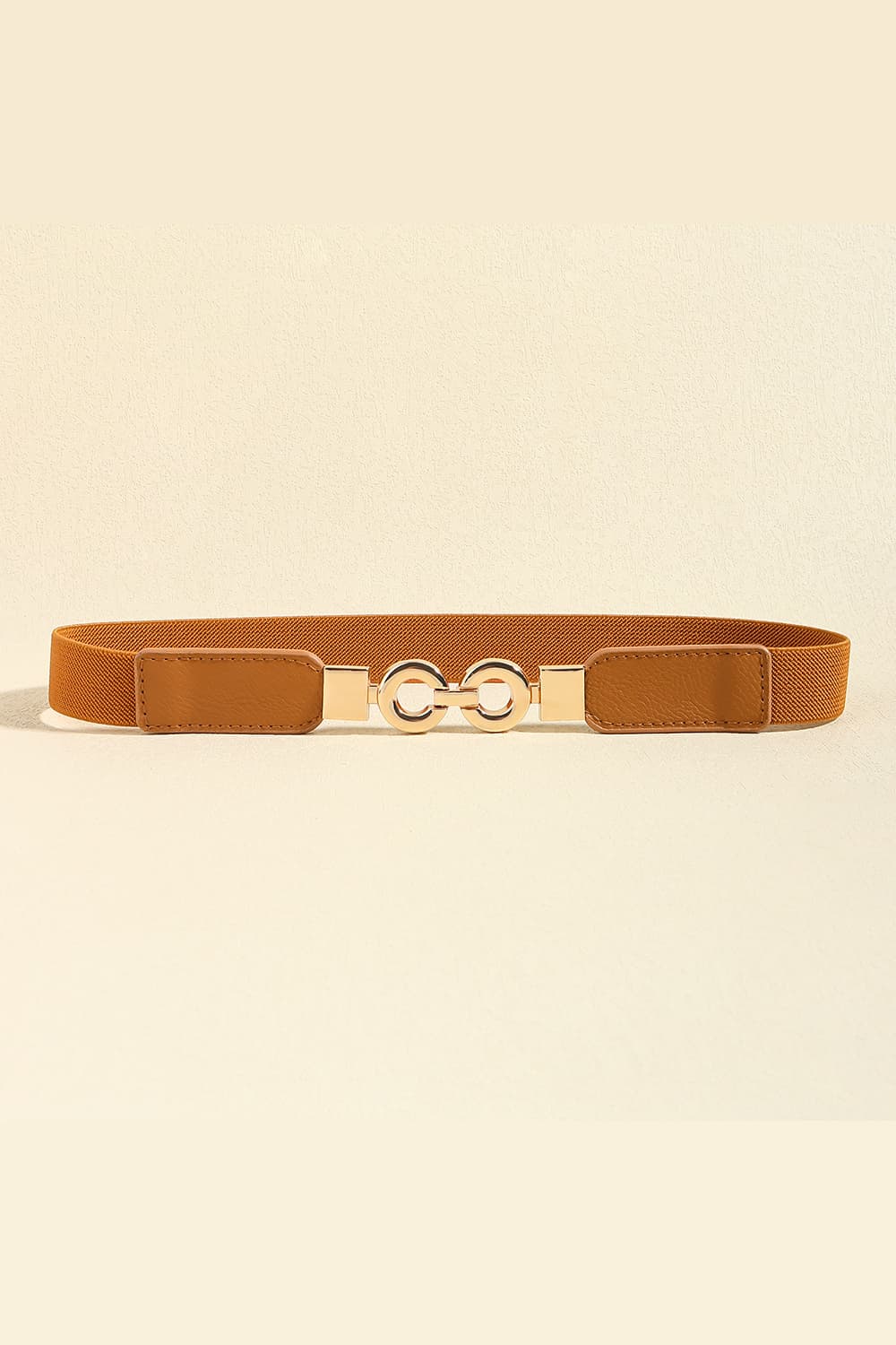 Caramel elastic belt with gold buckle and faux leather accents