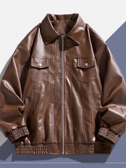 Brown leather zip-up jacket with chest pockets and elastic cuffs