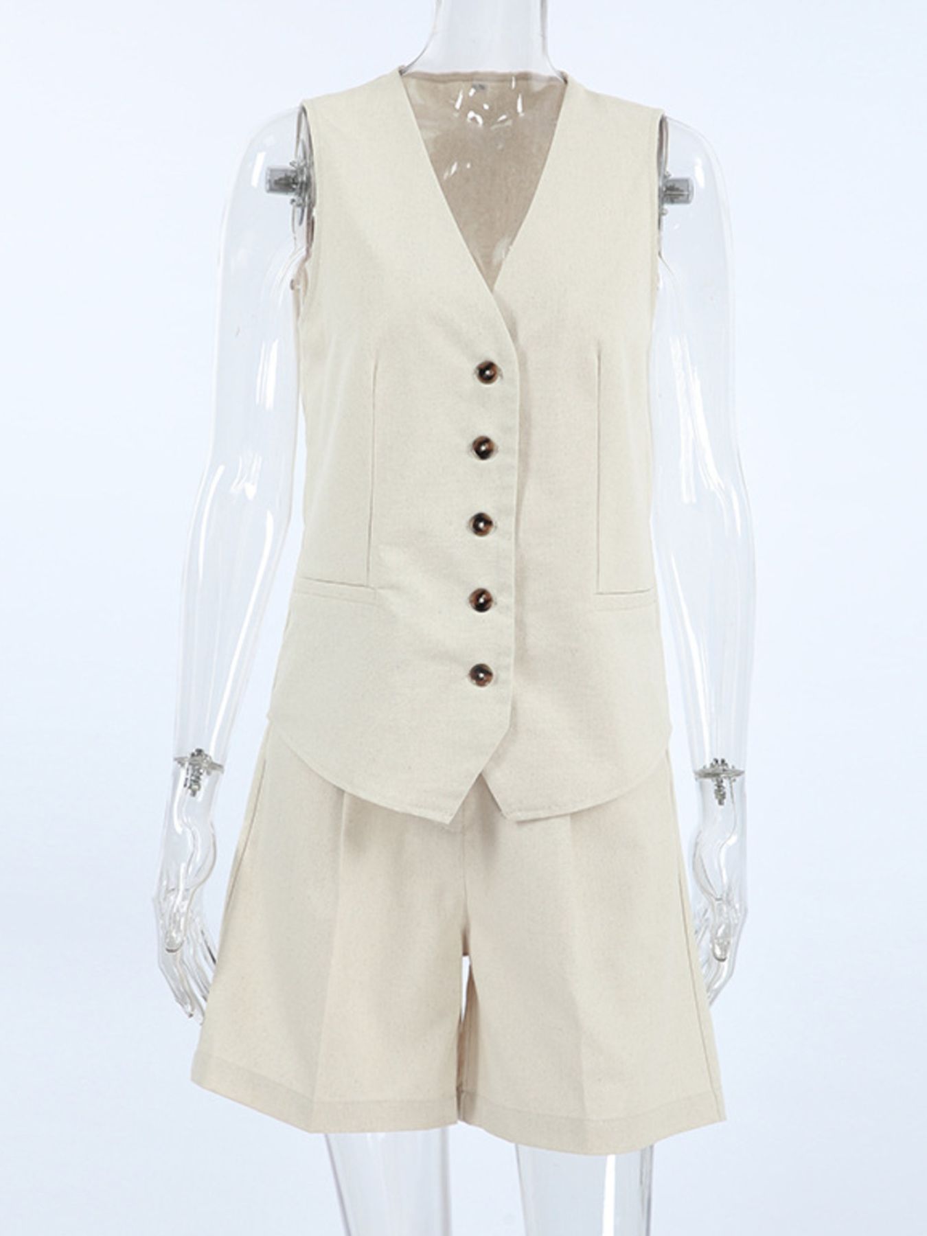 Buttoned vest and shorts set in beige cotton with V-neck and button front.