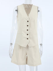 Buttoned vest and shorts set in beige cotton with V-neck and button front.