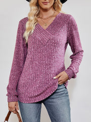 Textured ribbed V-neck pullover sweater in lilac with long sleeves and a relaxed fit.