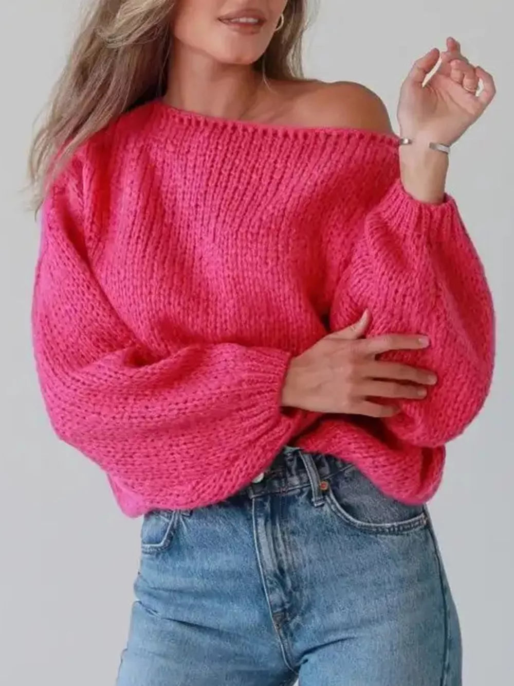 Hot pink chunky knit oversized sweater with balloon sleeves and boat neck.