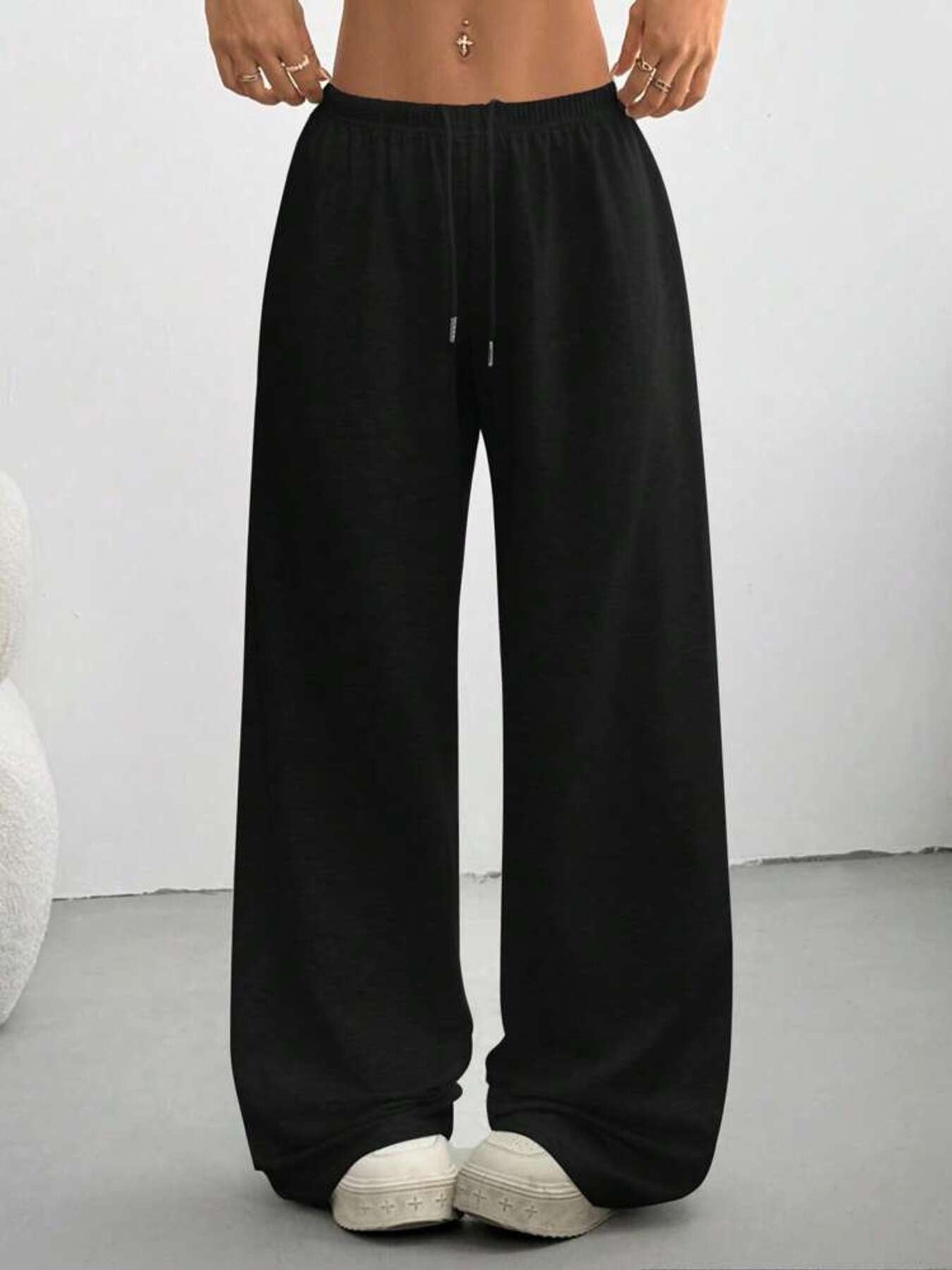 Black casual wide-leg drawstring maternity pants with a relaxed fit.