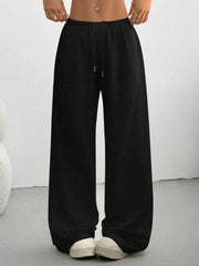 Black casual wide-leg drawstring maternity pants with a relaxed fit.