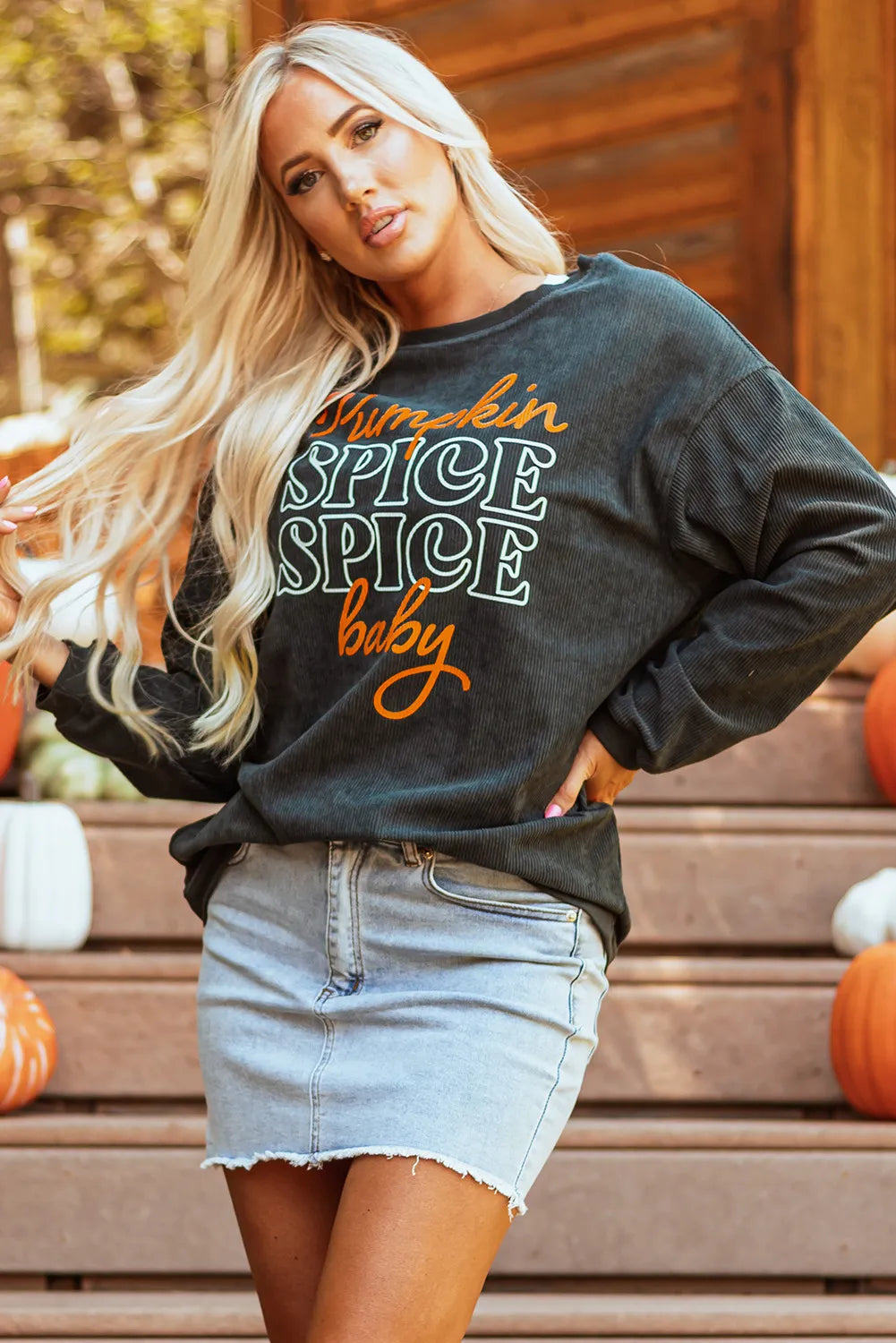 Textured corduroy sweatshirt in dark gray with "Pumpkin Spice Spice Baby" graphic.