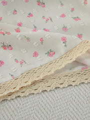 Cami and shorts set with delicate floral print and lace trim.