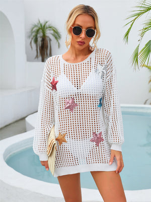 White open knit beach cover-up with sequin stars, crew neck, long sleeves.