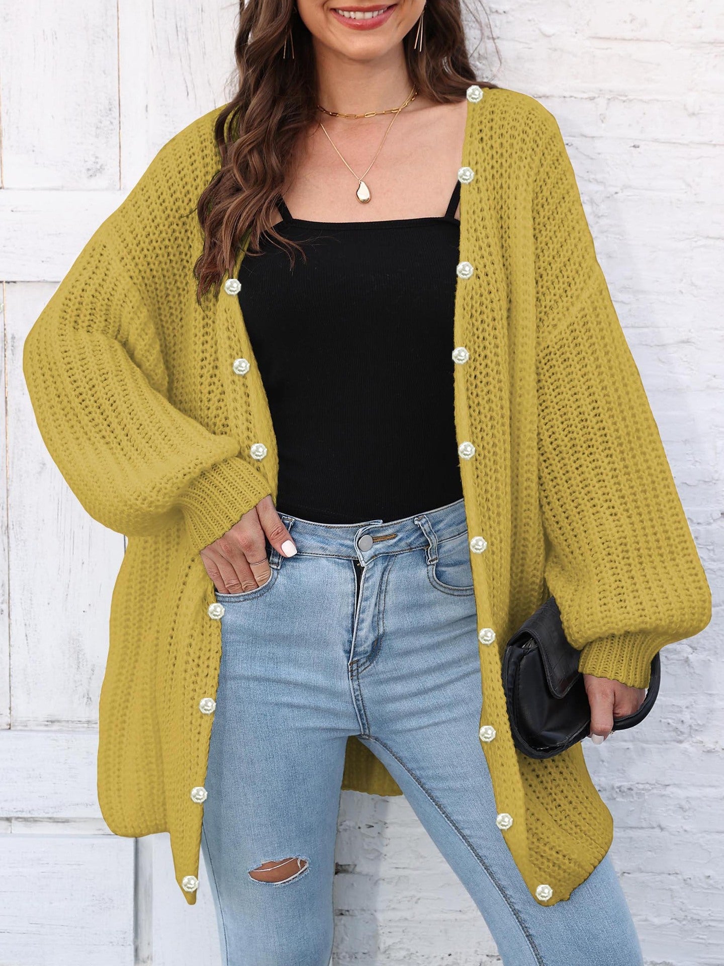Yellow balloon sleeve cardigan with pearl buttons, open front, and relaxed fit.