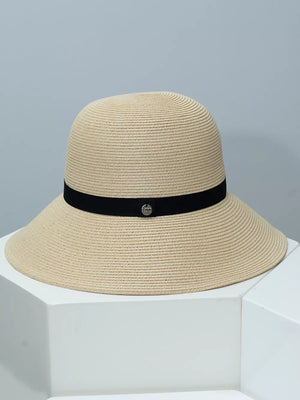 Beige straw sun hat with wide brim and black ribbon detail