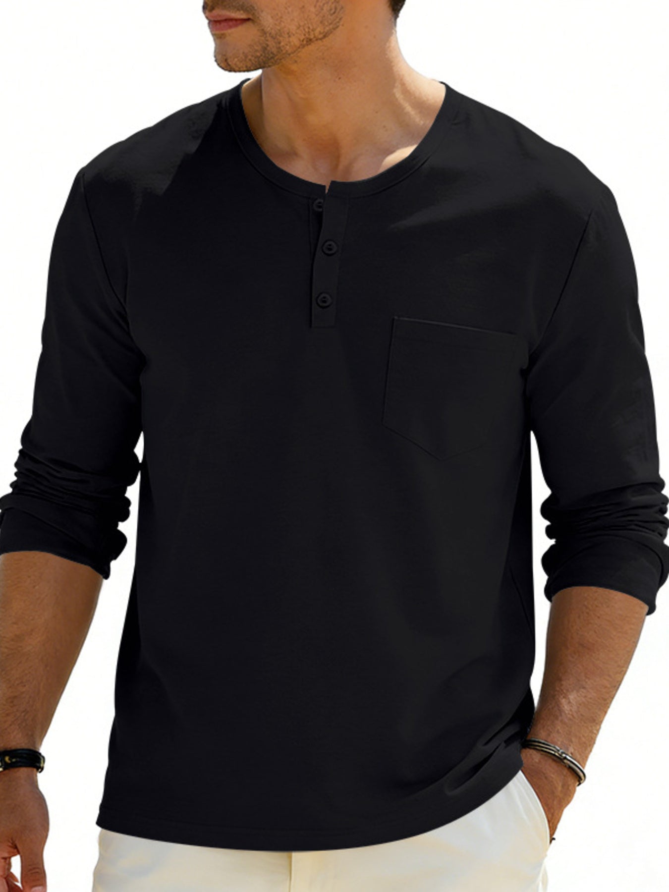 Black long sleeve pocketed henley t-shirt with button placket.