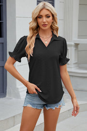 Black eyelet polo blouse with short ruffled sleeves