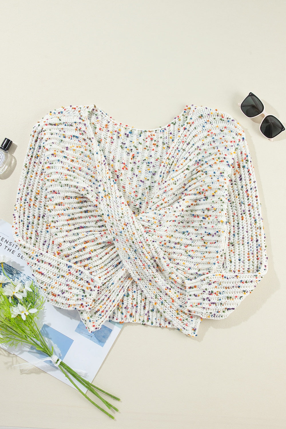 White confetti knit sweater with boatneck and twisted back detail
