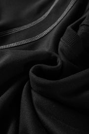 Black blouse with contrast stitching detail and puff sleeves
