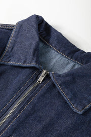Dark denim mini dress with puff sleeves, featuring a zipper closure and collar detail.