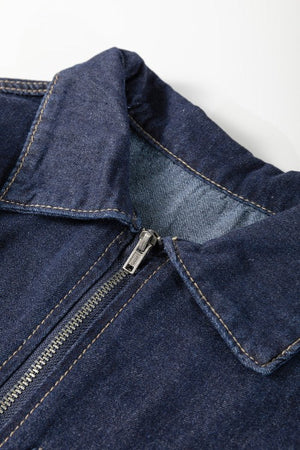 Dark denim mini dress with puff sleeves, featuring a zipper closure and collar detail.
