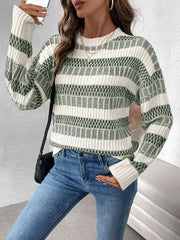 Chic contrast knit pullover sweater in sage green and white with a crew neck and long sleeves.