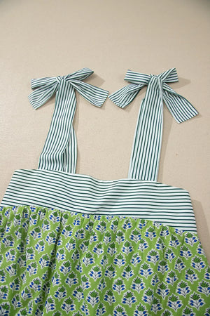 Floral tie-strap tank top with square neckline, green and blue print, cotton, green and white stripe bodice and straps.