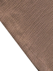 Brown crinkled wide-leg pants showing textured fabric detail