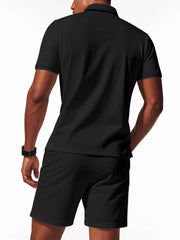 Black textured polo shirt and shorts ensemble for men, short sleeves, collared neckline.