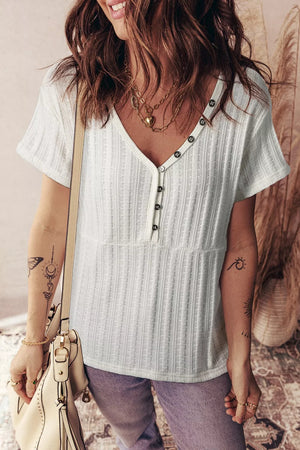 Textured white V-neck maternity t-shirt with short sleeves and button details