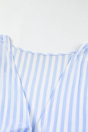 Light blue and white striped tie-front kimono jumpsuit with V-neckline.