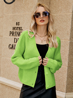 Yellow-Green textured button-down knit cardigan with ribbed details and a V-neck.
