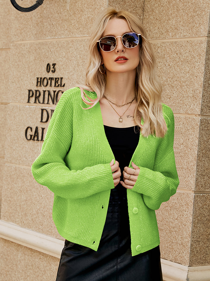 Yellow-Green textured button-down knit cardigan with ribbed details and a V-neck.