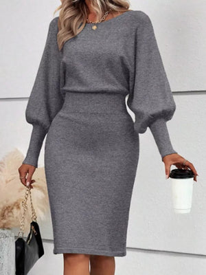Grey acrylic sweater dress with dramatic lantern sleeves and bodycon fit.