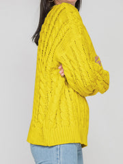 Banana yellow acrylic cable knit sweater with openwork details and crew neck.