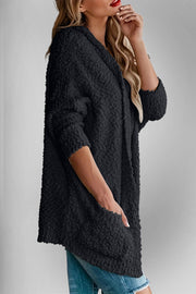 Black popcorn knit open cardigan with pockets and 3/4 sleeves