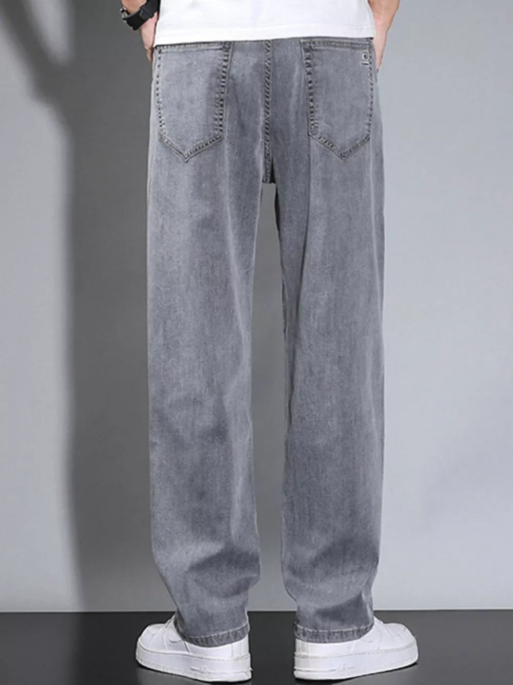 Men's Loose Fit Washed Jeans in Dark Gray, model styling view
