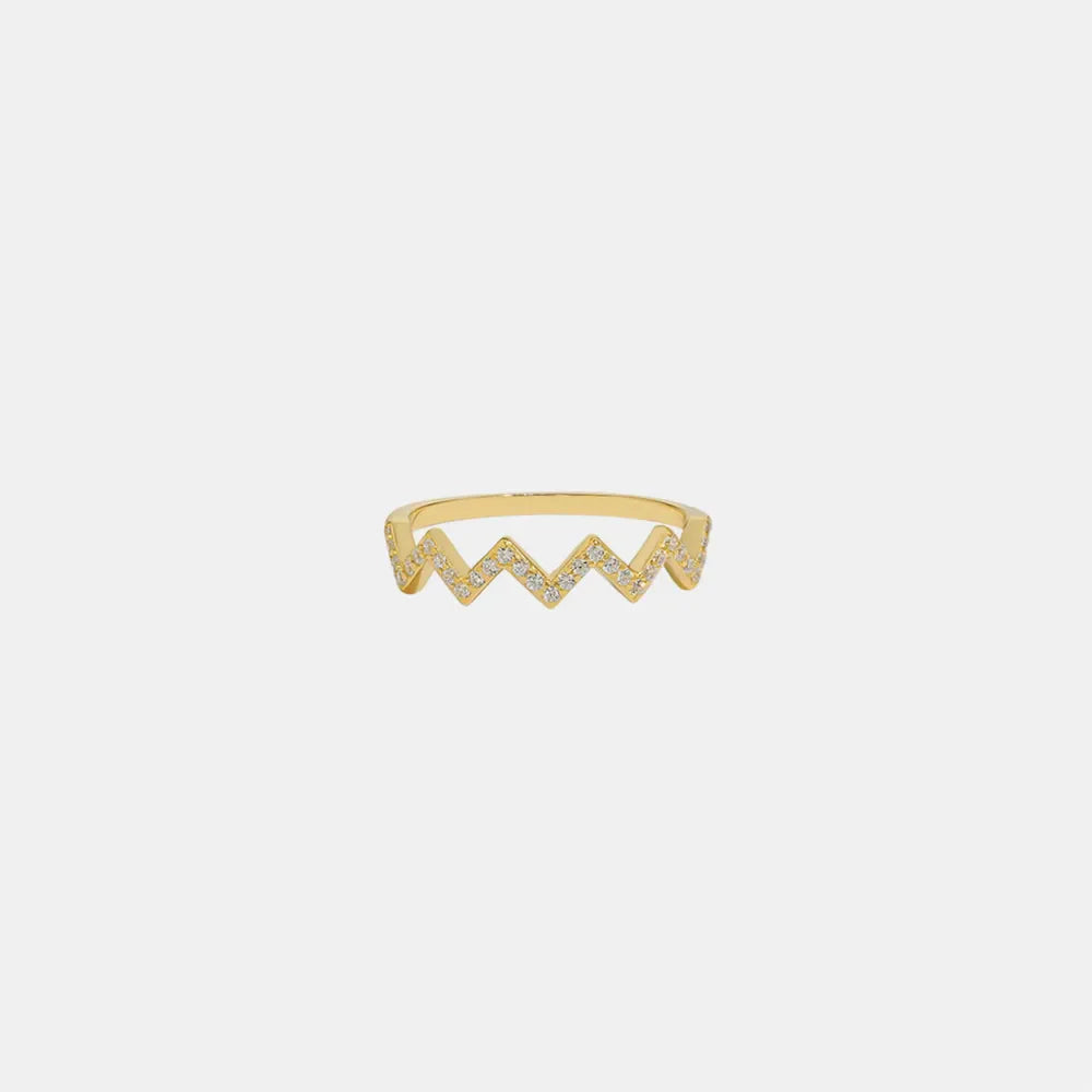 Gold zigzag pavé band ring with clear stones