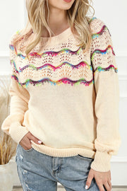 Cream acrylic knit sweater with colorful scallop detail and open knit yoke.