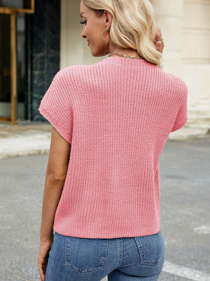 Knit cap-sleeve top in watermelon pink acrylic with ribbed texture and a chest pocket detail.
