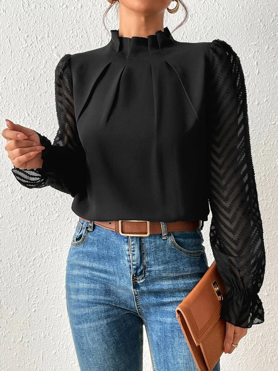 Black chevron sleeve ruffle neck blouse with pleated front detail.
