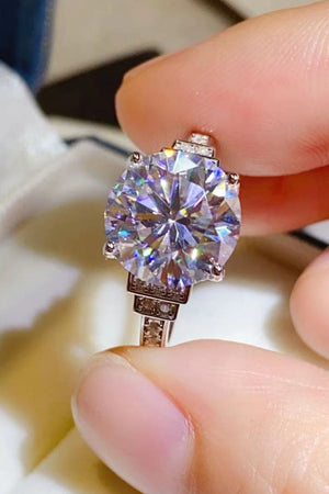 Sterling silver ring with radiant cut halo diamond and pavé band.