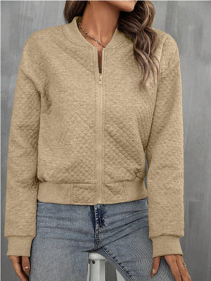 Diamond quilted bomber jacket in camel with a zip front and ribbed cuffs and hem.
