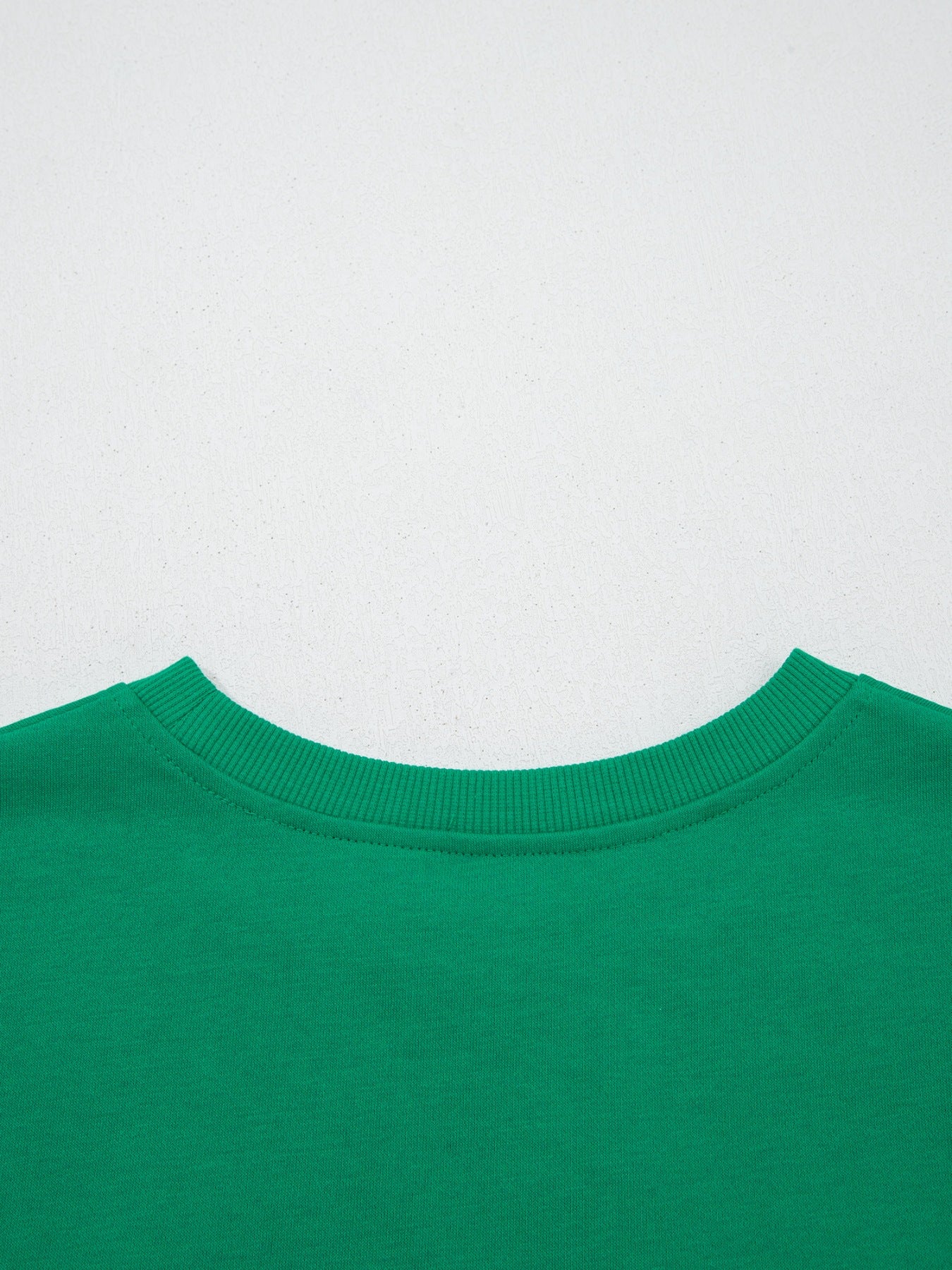 Green crew neck t-shirt with ribbed neckline detail