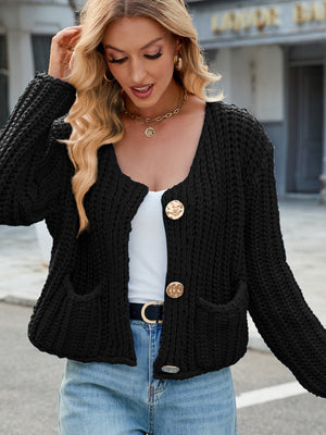 Black chunky knit cardigan with gold buttons and pockets