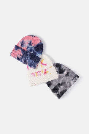 Ribbed knit beanies in Navy/Pink, White/Pink, and Gray tie-dye patterns.