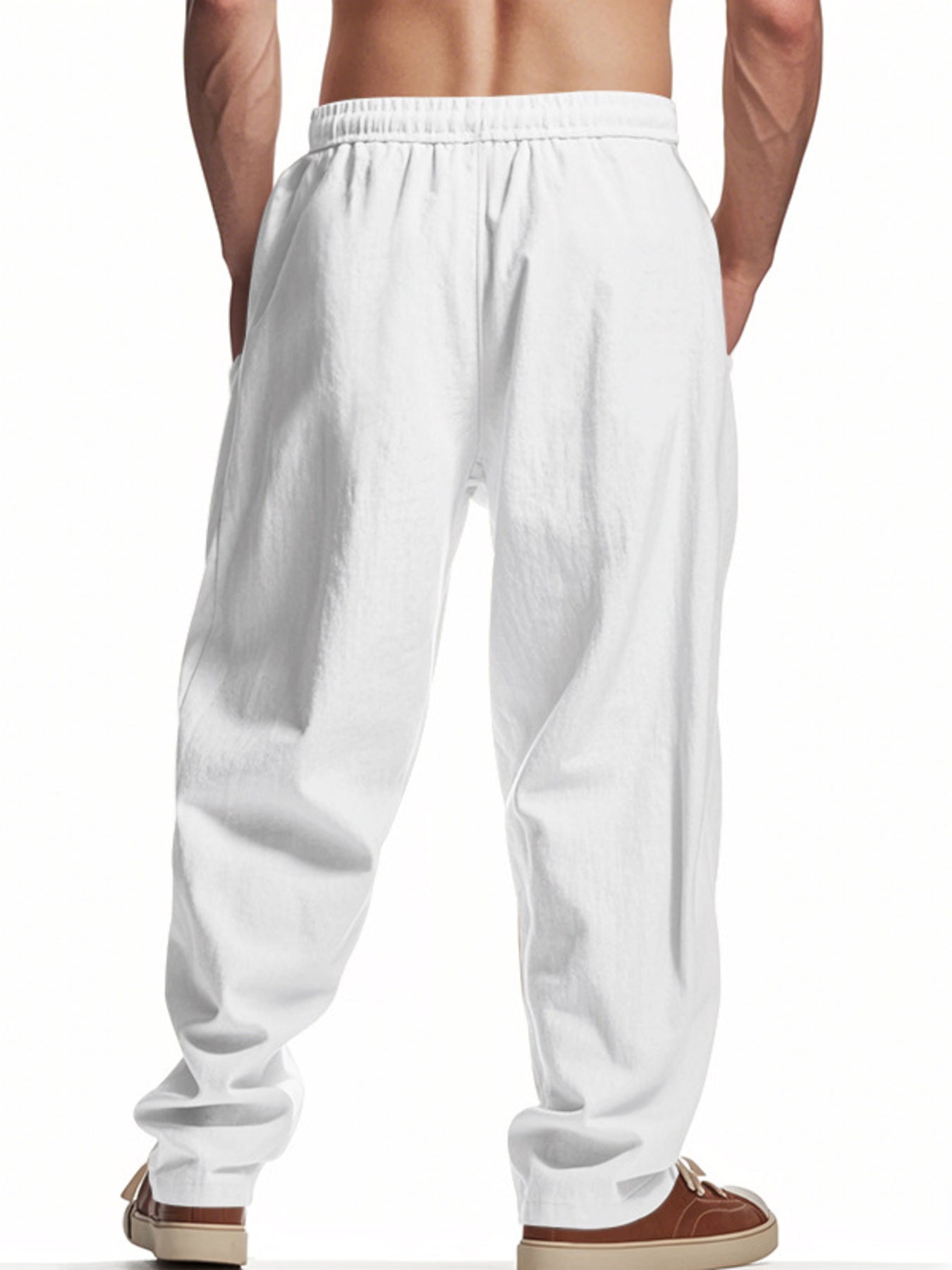 Men's white drawstring sweatpants with pockets and a relaxed fit.