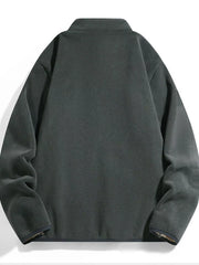 Fleece lined zip-up jacket in graphite gray with a stand-up collar.