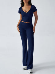Dark blue ruched waistband flared lounge pants and V-neck crop top set