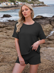 Black textured knit co-ord set with relaxed fit t-shirt and shorts.