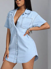 Light blue denim shirt dress with pockets, collared, button-down, short sleeves.