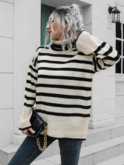 Flared sleeve striped turtleneck sweater in black and beige acrylic with a relaxed fit.